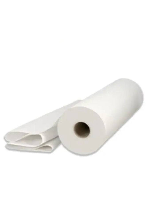 a roll of medical bed sheet on a white background
