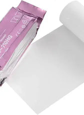 a roll of printer paper next to a roll